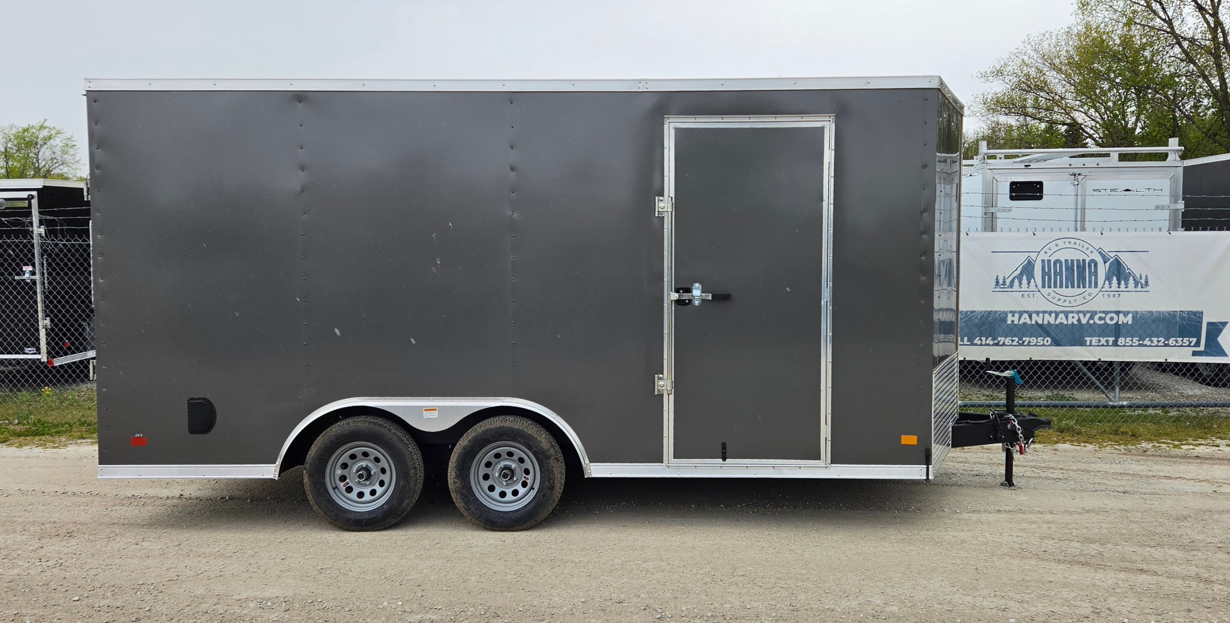 DarkHorse 8.5X16 Wedge Nose Tandem Axle Steel Cargo Trailer with Ramp Door, 6" Extra Height - 2500 Series - Charcoal
